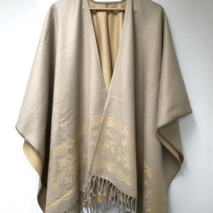 Super soft Poncho with Jacquard detail and fringe / tassel edge